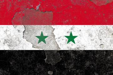 Syria flag on a damaged old concrete wall surface