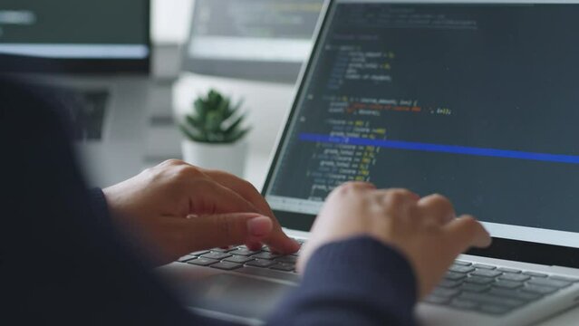 Closeup hand of developer programmer, soffware engineer, IT support, typing on computer keyboard