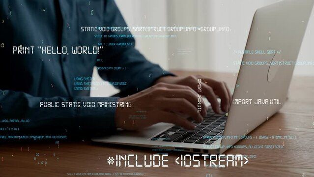 Computer programmer uses capable laptop computer to develop programming code of new software . Computer specialist working on future coding application for software programming development .