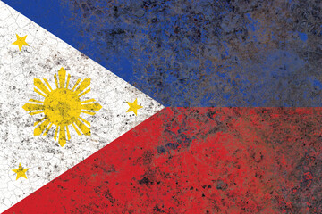 Philippines flag on a damaged old concrete wall surface