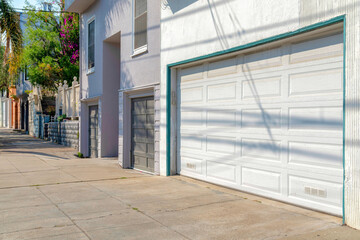 Neighborhood with attached garage and concrete driveways at San Francisco, California