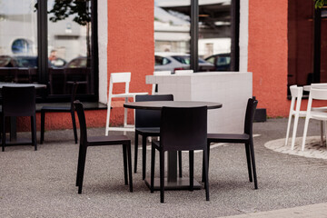  outdoor chairs and tables from a street restaurant