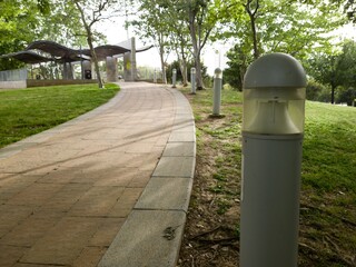 Lights Near a Sidewalk in a Park