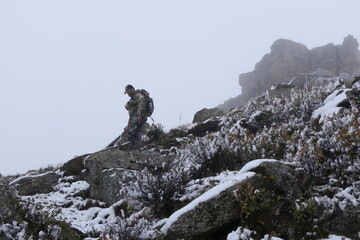 Bow Hunter in the mountains