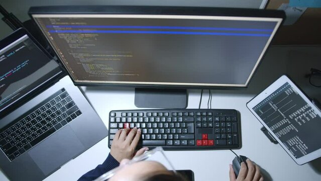 Timelapse developer programmer, software engineer, IT support working on computer laptop, typing keyboard, to check coding in bugging system. Top view