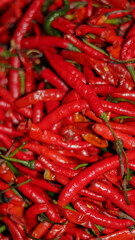 Red chili peppers close up - red chili in the supermarket