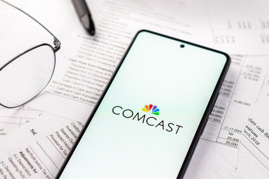 West Bangal, India - April 20, 2022 : Comcast logo on phone screen stock image.