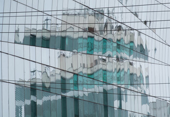Obraz na płótnie Canvas Turquoise building reflection, Lima, Peru.