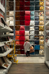 Woman shopping in home goods store, Bogotá, Colombia.