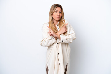 Young Uruguayan woman isolated on white background pointing to the laterals having doubts