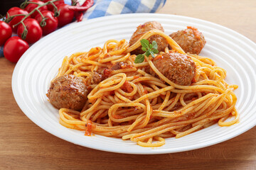 Spaghetti with meatball in tomato sause