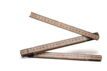 closeup wood folding rule shadow white background