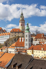 Obraz premium Beautiful view to church and castle in Cesky Krumlov, Czech republic. Vertically. 