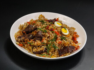 Uzbek traditional plov - rice with meat