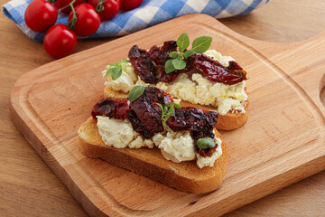 Bruschetta with soft cheese and tomato