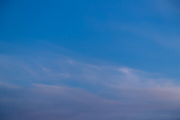 Blue sky cirrus clouds.
