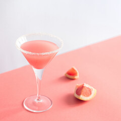 Grapefruit juice in a cocktail glass with a sugar rim