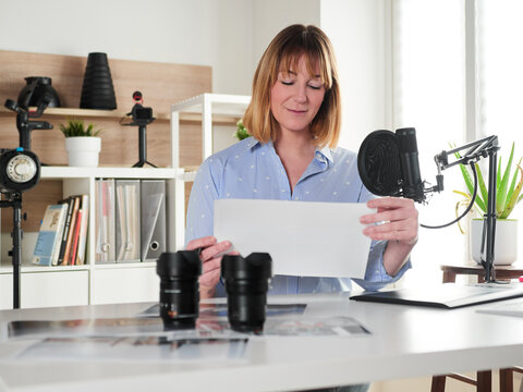 Female photographer working at office studio