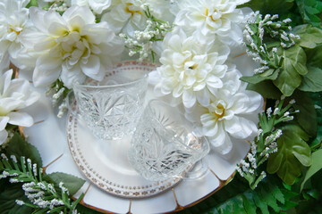 Floral Arrangement Design Beautiful Wedding Invitation Concept Crystal Glasses White Flowers and Greenery 