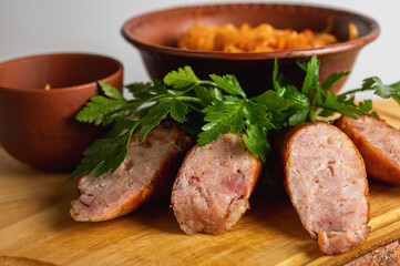 meat tray, sausage, cabbage, hot snack for a feast. Delicious hot food concept