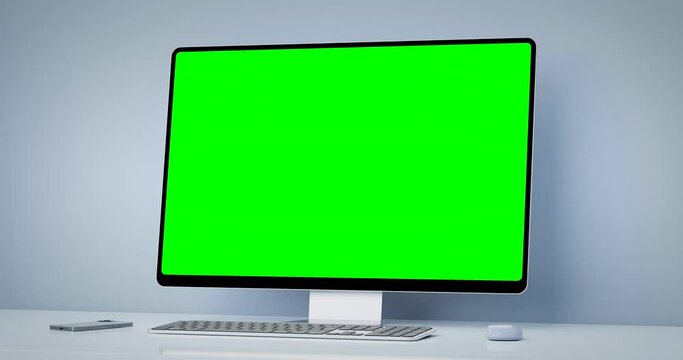 Computer all-in-one with a blank screen front in industrial loft office interior - camera move around an object - luma matte, green screen, and tracking layer included.