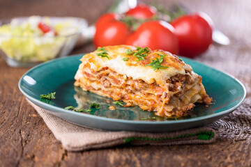 lasagna on a green plate