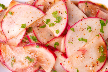 Turkish appetizers; sliced radish appetizer with sour, Turkish name; Turp mezesi