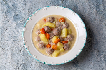 Seasoned soup with meatballs with vegetables. Turkish name; sulu kofte, eksili kofte, terbiyeli kofte)
