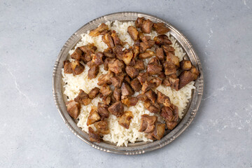 Traditional Turkish food; Roasted meat on rice (Turkish name; pilav üstü kavurma, kurban kavurma)