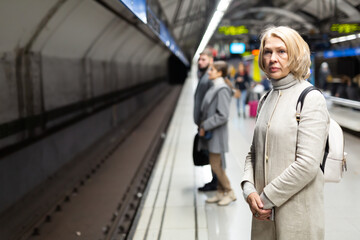 Woman waiting for the subway train