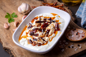 Traditional Turkish and Greek Meze with chili peppers. Turkish Appetizer Atom with yogurt. Turkish atom meze
