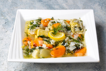 A dish with olive oil from Turkish Aegean cuisine; artichoke dish with rice and olive oil (Turkish name; zeytinyagli enginar)