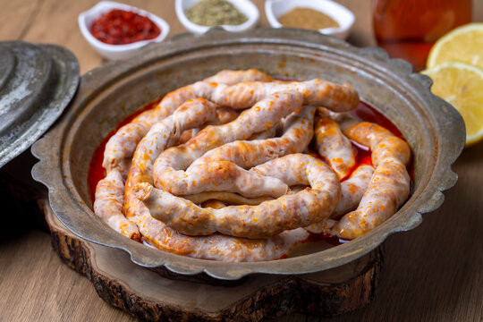 Traditional delicious Turkish cuisine, Middle Eastern dishes, offal dishes, stuffed sheep intestines (Turkish name; Mumbar dolmasi)