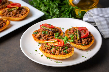 Traditional Turkish food; baked potato dish with minced meat, Turkish name; Patates karniyarik