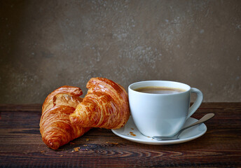 cup of coffee and croissants