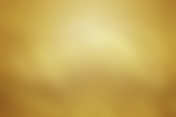 gold or golden abstract background with soft glowing backdrop texture for christmas and valentine.