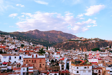 Fototapeta na wymiar Blue sky in a magical town, Taxco de Alarcon, Guerrero Mexico, Latin America. 