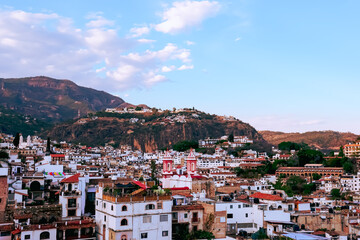 The white houses with tiled roofs are characteristic of Taxco, Guerrero, Mexico. Latin America.