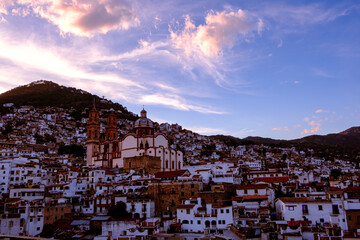 Taxco de Alarcon, Guerrero, Mexico. Golden hour photo in a magical town.  Blue sky. Latin America. 