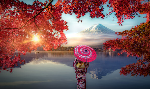 Colorful Autumn Season and Mountain Fuji with Asian woman wearing japanese traditional kimono at lake Kawaguchiko is one of the best places in Japan