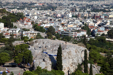 Areopagus (Mars Hill) behind Athens City from Acropolis in Greece. Mars Hill is a prominent site located 140 feet below the Acropolis.