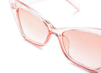 Stylish plastic eyeglasses on white background, closeup