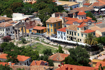 Historical columns in the middle of old town Athens view from Acropolis in Greece. Athens is one of the world's oldest cities.