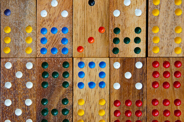 Colored points on wooden domino games