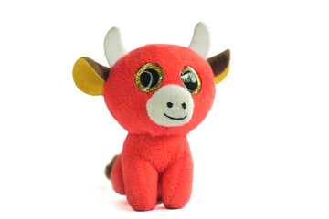 Isolated cow toy photo. Isolated cow toy side and angle view.