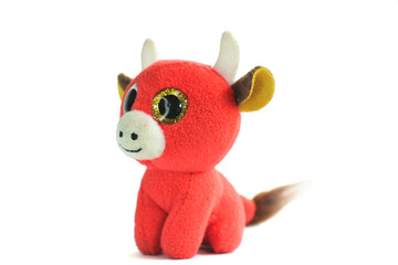 Isolated cow toy photo. Isolated cow toy side and angle view.