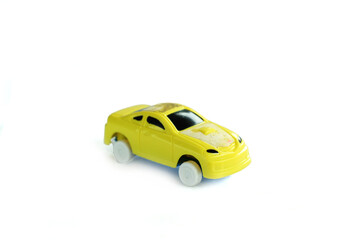 Fototapeta na wymiar Close-Up Of Children's toy Car On White Background.