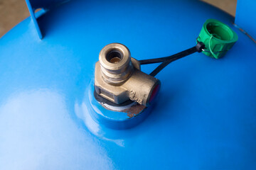 closeup of a domestic LPG gas cylinder valve, used in for cooking in the home kitchen