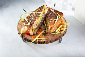 A view of an Indian style panini sandwich.