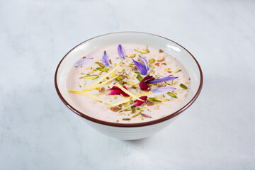 A view of a bowl of rice pudding.